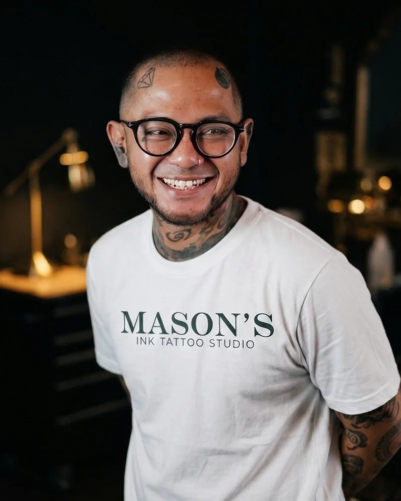 Ucha, independent tattoo artist at Mason's Ink