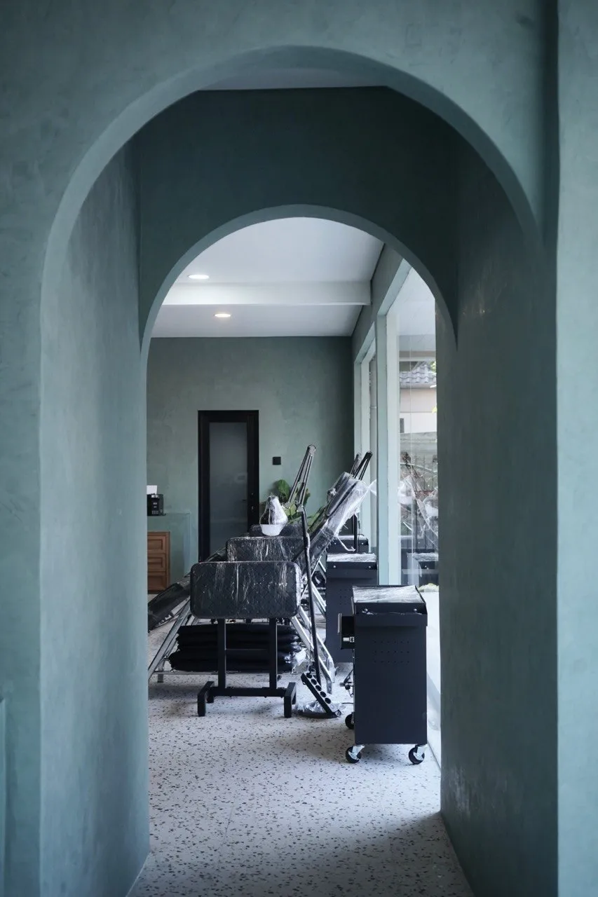 Green arched doorways leading to the tattoo floor at Mason's Ink Raya Taman