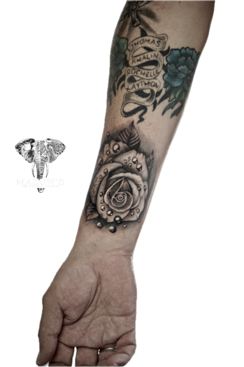 Black and Grey Floral Tattoo Design