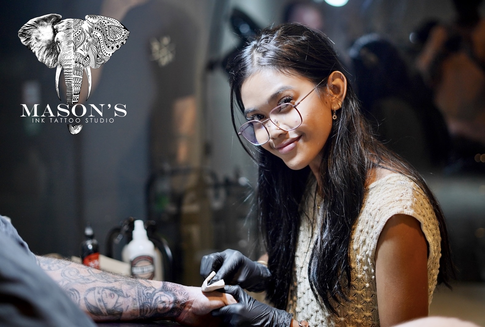 Tattoo artists, staff and customers at Mason's Ink Tattoo Studio, Bali
