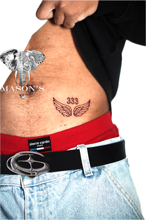 Fine Line Wings and Script Tattoo Design