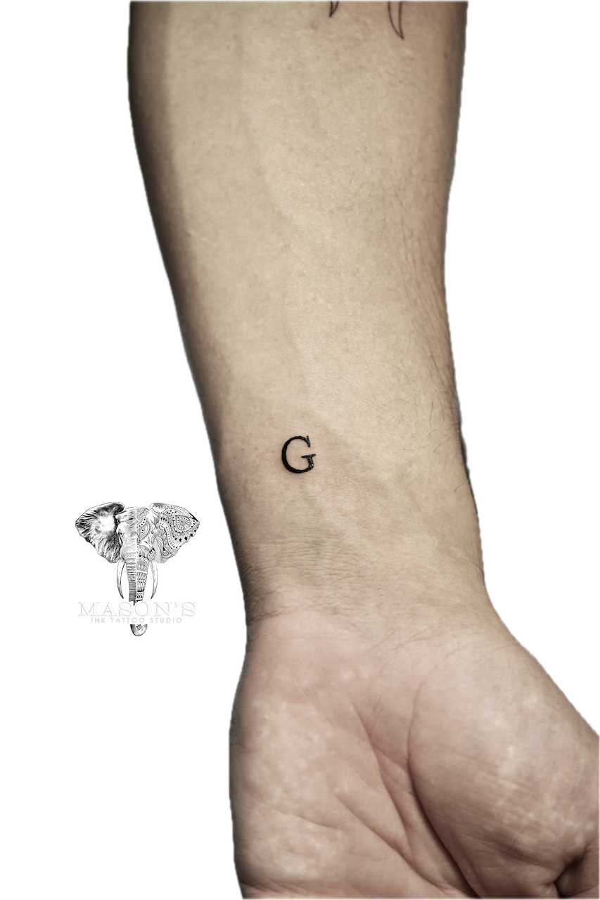 Fine Line Script G Tattoo Design