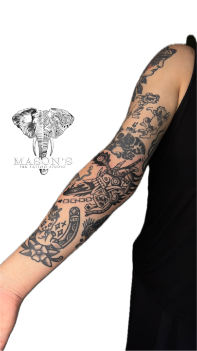 Black and Grey Traditional Patchwork Sleeve Tattoo Design