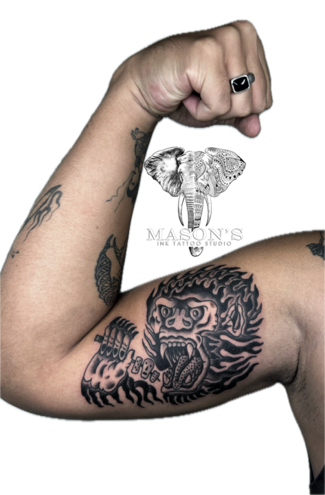 Fierce Monkey Head with Flames Tattoo Design